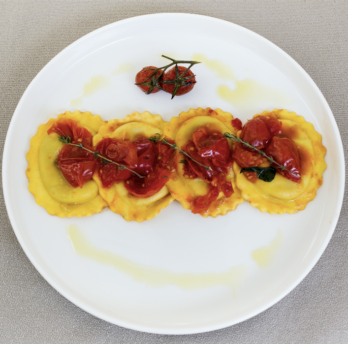 Ravioli with aubergine and smoked provola cheese, and cherry tomato sauce