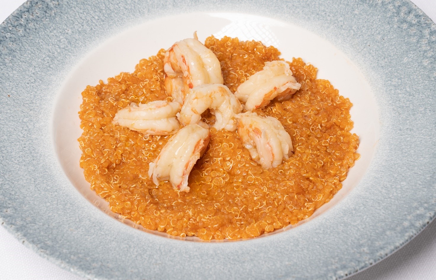 Quinoa with tomato sauce and shrimp