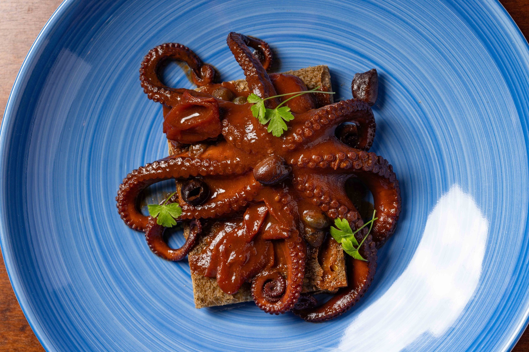 Octopus ‘alla luciana’ (from the Santa Lucia area of Naples) with canned cherry tomatoes